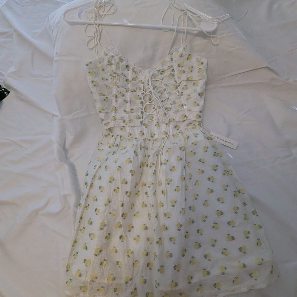 White Dress with Yellow Floral Pattern